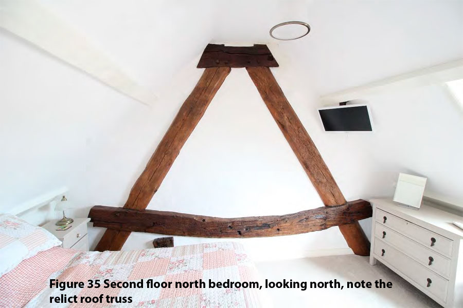 Figure 35 Second floor north bedroom, looking north, note the relict roof truss